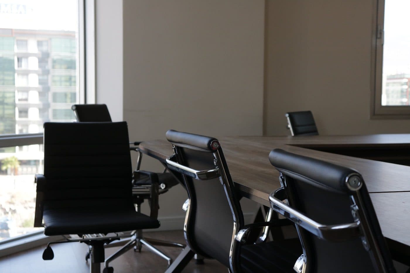 Conference table and executive chairs in a law firm meeting room